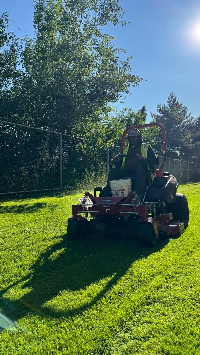 Commercial lawn mowing crew